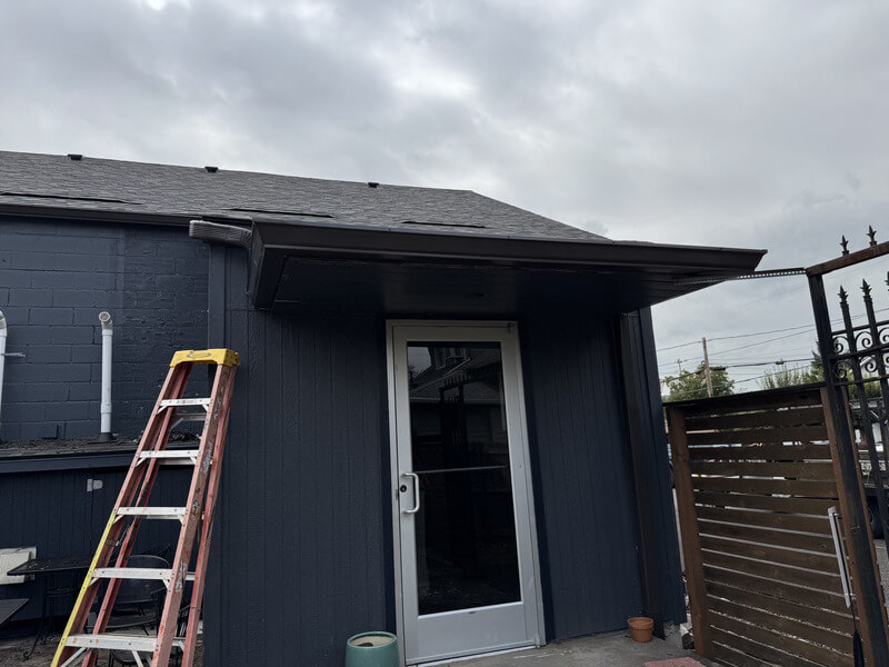 Black gutters installed to a home