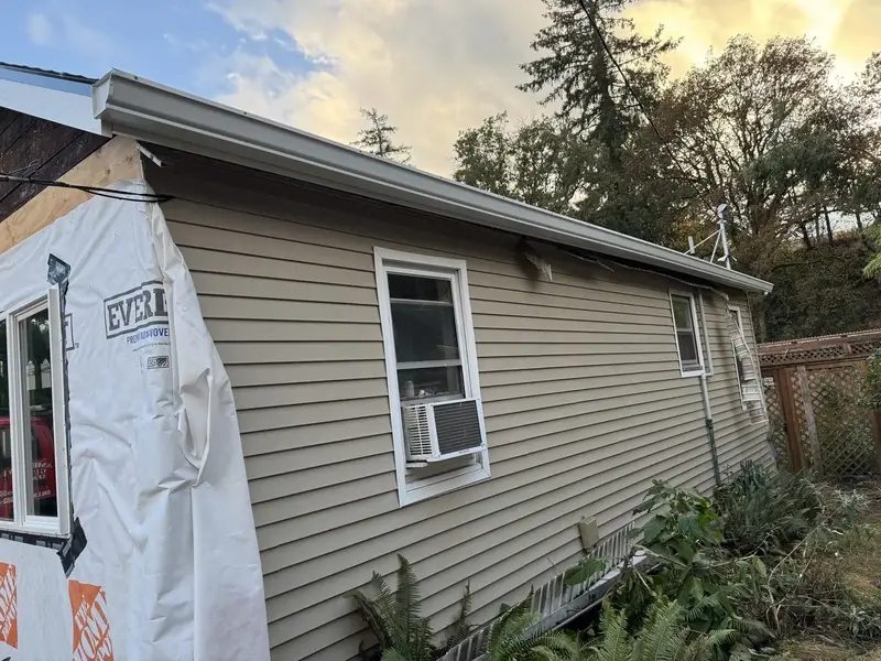 house with new seamless gutters