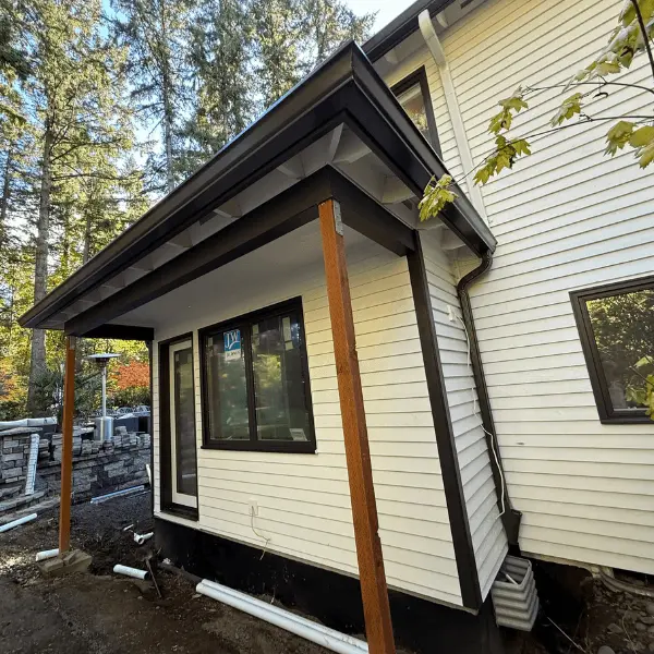 Black Seamless gutter and downspout installed on a Beaverton, Oregon home